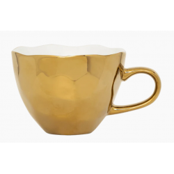 tasse à thé dorée